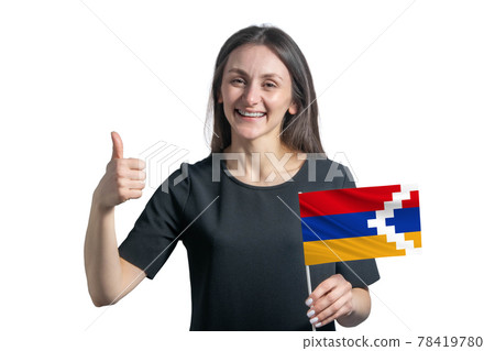 Happy young white woman holding flag of Nagorno-Karabakh Republic and shows the class by hand isolated on a white background Happy young white woman holding flag of Nagorno-Karabakh Republic and shows the class by hand isolated on a white background 78419780
