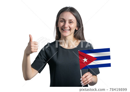 Happy young white woman holding flag of Cuba and shows the class by hand isolated on a white background 78419899
