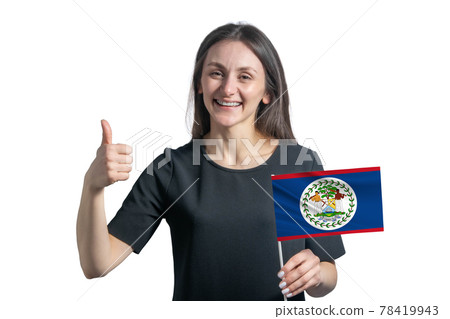 Happy young white woman holding flag of Belize and shows the class by hand isolated on a white background 78419943