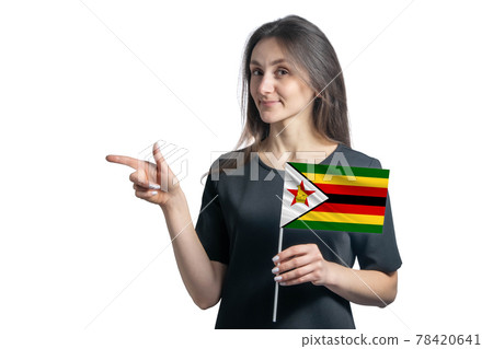 Happy young white woman holding flag Zimbabwe and points to the left isolated on a white background Happy young white woman holding flag Zimbabwe and points to the left isolated on a white background 78420641