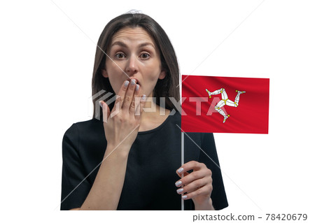 Happy young white woman holding flag of Isle of Man and covers her mouth with her hand isolated on a white background Happy young white woman holding flag of Isle of Man and covers her mouth with her hand isolated on a white background 78420679