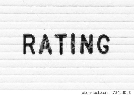 Black alphabet letter in word rating on white felt board background Black alphabet letter in word rating on white felt board background 78423068