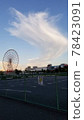Mysterious clouds and ferris wheel 78423091