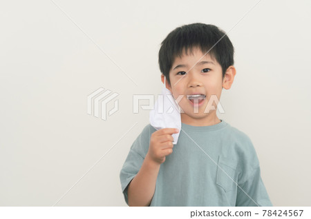 Boy wearing a breathable summer mask 78424567