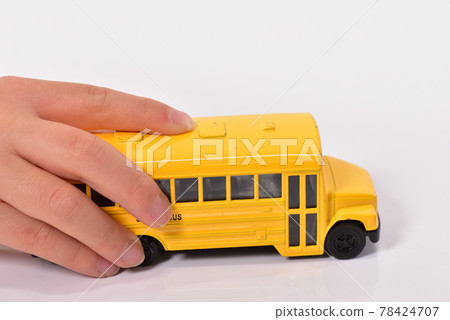 Hand-pushed toy school bus Hand-pushed toy school bus 78424707
