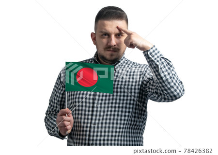White guy holding a flag of Bangladesh and a finger touches the temple on the head isolated on a white background 78426382