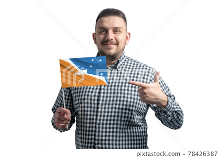 White guy holding a flag of Argentine Antarctica and points the finger of the other hand at the flag isolated on a white background White guy holding a flag of Argentine Antarctica and points the finger of the other hand at the flag isolated on a white background 78426387