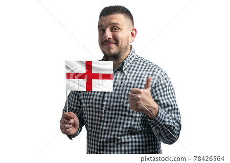 White guy holding a flag of England and shows the class by hand isolated on a white background. Like for England White guy holding a flag of England and shows the class by hand isolated on a white background. Like for England 78426564