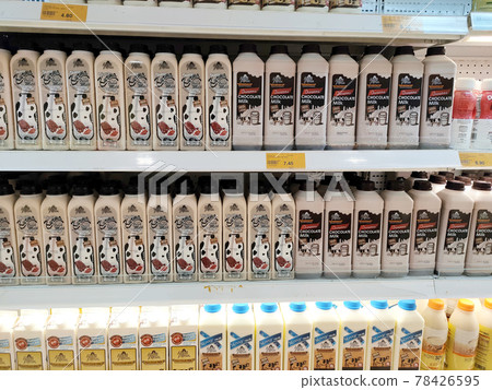 PENANG, MALAYSIA -JULY 9, 2020: Selected focused on milk drinks in boxes that come with various flavors and brands. Displayed on cold shelves. Placed price tag. PENANG, MALAYSIA -JULY 9, 2020: Selected focused on milk drinks in boxes that come with various flavors and brands. Displayed on cold shelves. Placed price tag. 78426595