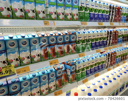 PENANG, MALAYSIA -JULY 9, 2020: Selected focused on milk drinks in boxes that come with various flavors and brands. Displayed on cold shelves. Placed price tag. PENANG, MALAYSIA -JULY 9, 2020: Selected focused on milk drinks in boxes that come with various flavors and brands. Displayed on cold shelves. Placed price tag. 78426601