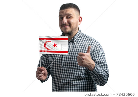 White guy holding a flag of Turkish Republic of Northern Cyprus and shows the class by hand isolated on a white background. Like for Turkish Republic of Northern Cyprus White guy holding a flag of Turkish Republic of Northern Cyprus and shows the class by hand isolated on a white background. Like for Turkish Republic of Northern Cyprus 78426606