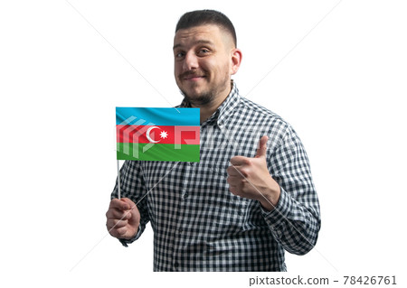 White guy holding a flag of Azerbaijan and shows the class by hand isolated on a white background. Like for Azerbaijan White guy holding a flag of Azerbaijan and shows the class by hand isolated on a white background. Like for Azerbaijan 78426761