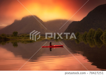 Adventure Caucasian Adult Woman Kayaking in Red Kayak 78427251