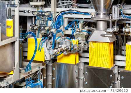 Production line in the food industry for packaging bulk products in paper bags. 78429620