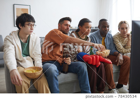 Fans Watching Sports Game at Home 78430534