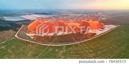 Fertilizer industrial plant. Artificial hills of dumps in production of potash.  78430573