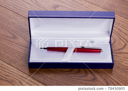 Pen as a present in a gift box. Pen as a present in a gift box. 78430905