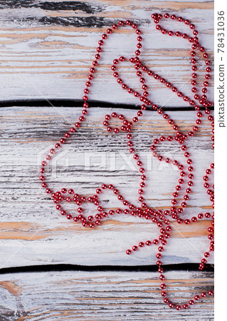 Long handcraftednecklace made of red glass beads. Long handcraftednecklace made of red glass beads. 78431036