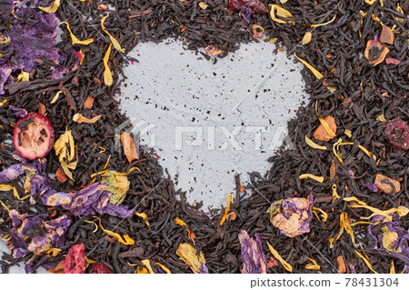 Heart made of dried black tea. 78431304
