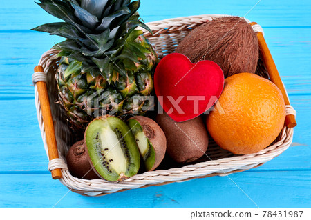 Composition from tropical fruits and red heart. Composition from tropical fruits and red heart. 78431987