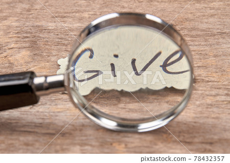 Magnifying glass zooming give word. Magnifying glass zooming give word. 78432357