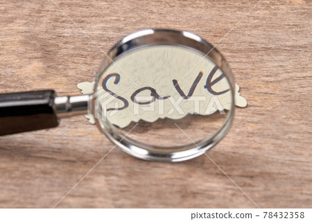Magnifier and save concept. 78432358