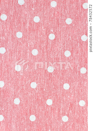Pink cloth with polka dots. 78432572