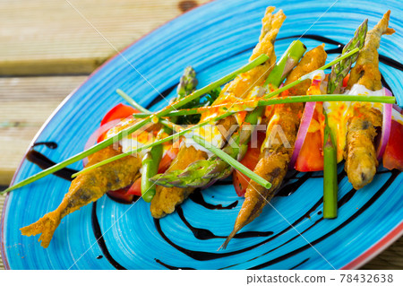 Battered sprats with creamy ginger sauce, tomatoes, balsamic Battered sprats with creamy ginger sauce, tomatoes, balsamic 78432638