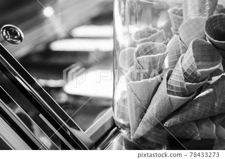 traditional italian gelato ice cream wafer cones in shop display 78433273