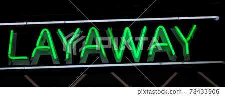 Vintage Neon Sign in Window of Pawn Shop Vintage Neon Sign in Window of Pawn Shop 78433906