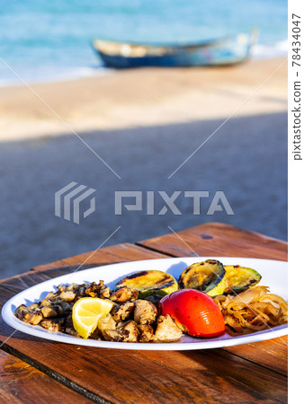 Grilled rapana dish on Black Sea, Vama Veche - Romania 78434047