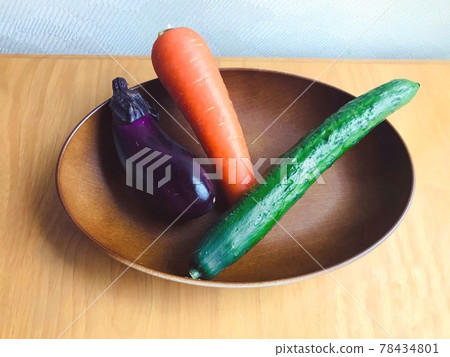 Vegetables and wooden plate Vegetables and wooden plate 78434801