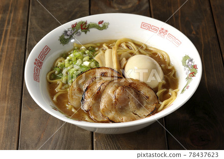 Pork bone soy sauce ramen with roasted char siu, taste balls, menma and all-purpose green onions Pork bone soy sauce ramen with roasted char siu, taste balls, menma and all-purpose green onions 78437623