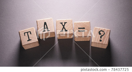 Tax Word with Wooden Cubes 78437725