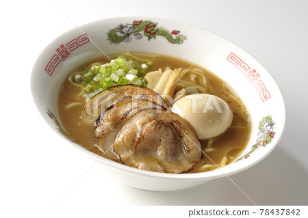 Photographed pork bone soy sauce ramen with roasted char siu, taste balls, menma and all-purpose green onions on a white background 78437842