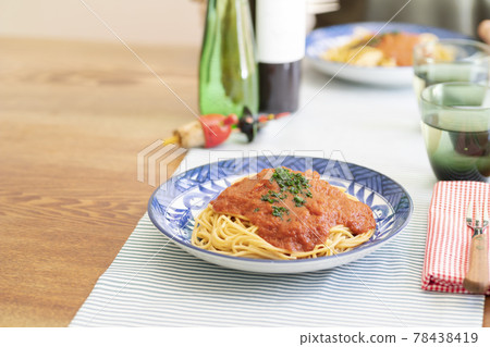 Dining table with spaghetti, Italian lunch [Meal] 78438419