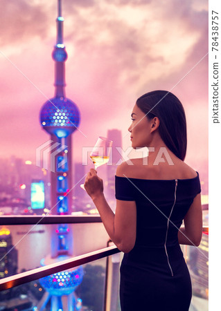 Elegant woman drinking wine - Shanghai rooftop bar Elegant woman drinking wine - Shanghai rooftop bar 78438757