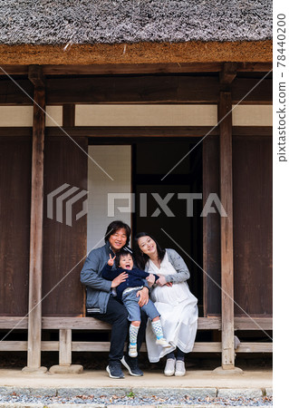 A family of three in an old folk house A family of three in an old folk house 78440200