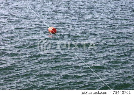 Buoy floating on the sea surface Buoy floating on the sea surface 78440761