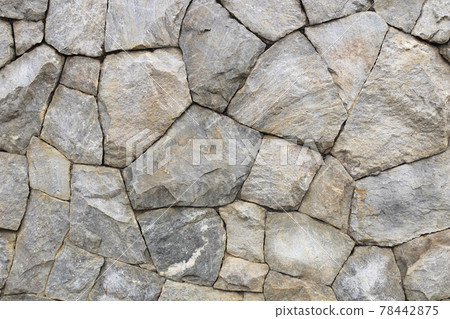 Stone wall as a background or texture. Stone wall as a background or texture. 78442875