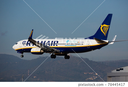 Passenger Airplane of company Ryanair during landing 78445417