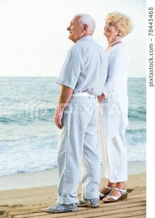 portrait of pensioners standing back together portrait of pensioners standing back together 78445468