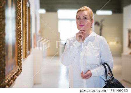 Closeup on mature female visiting museum 78446085