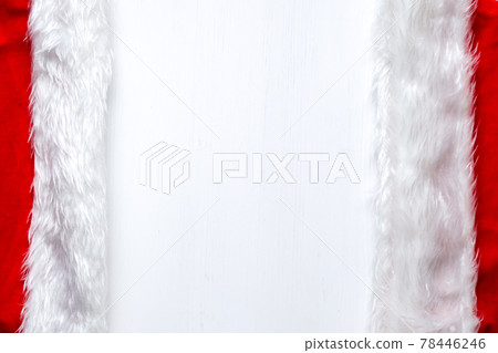 Two Santa Claus hat symmetrically opposite each other on backgro Two Santa Claus hat symmetrically opposite each other on backgro 78446246