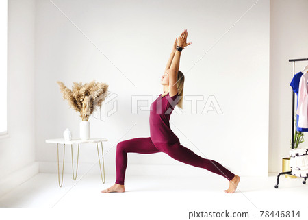 Young woman meditating in yoga pose Young woman meditating in yoga pose 78446814