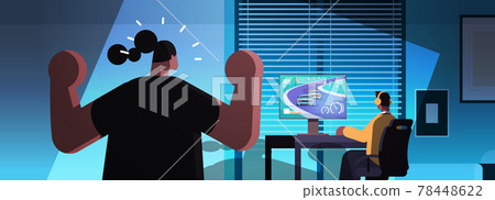 mother shouting at son gamer playing video game on computer boy in headphones sitting in front of monitor mother shouting at son gamer playing video game on computer boy in headphones sitting in front of monitor 78448622