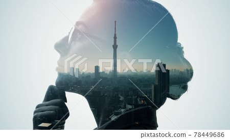 City and female silhouette double exposure 78449686
