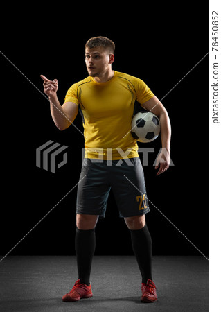 The male unhappy soccer or football player arguing with a judge. The professional soccer football and human emotions concept. 78450852