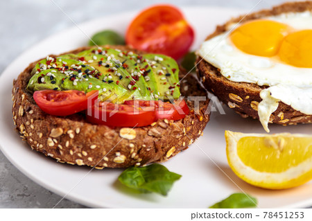 Egg breakfast with avocado toast healthy vegan Egg breakfast with avocado toast healthy vegan 78451253