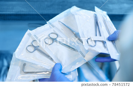 Packaged dental products in sealed sealed packaging. The concept of sterilization and disinfection in a dental clinic. 78451572